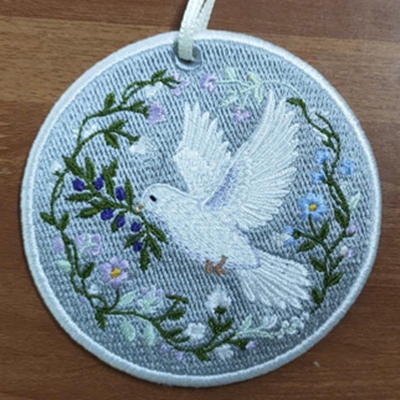 Computer Embroidery on a Round Frame - Dove