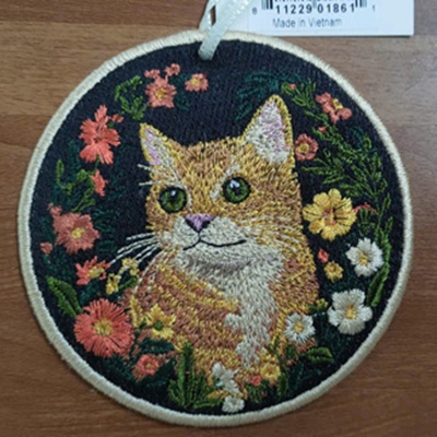 Computer Embroidery on a Round Frame - Cat & Flower