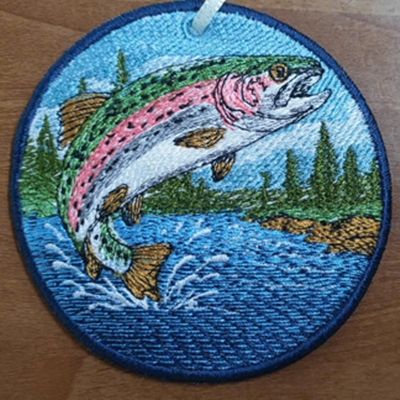 Computer Embroidery on a Round Frame - Salmon