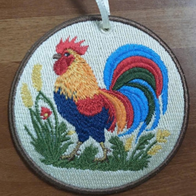Computer Embroidery on a Round Frame - Rooster
